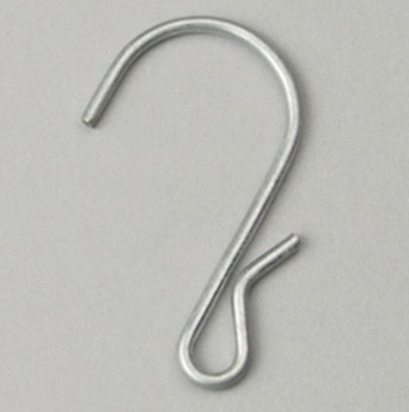 Galvanized pinched S-hooks securing merchandising strips to perforated gondola shelving in a retail store