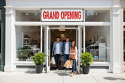 Economical Grand Opening Vinyl Banner 5x3 Storefront Lifestyle