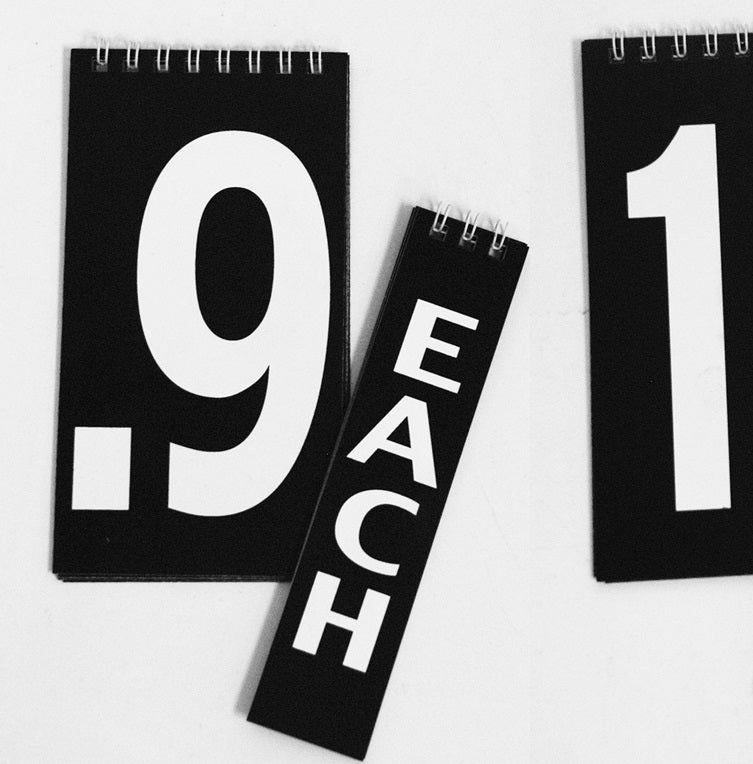 Small Black Double-Sided Spiral Sign Board – 1 Piece