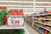 Holiday Values shelf sign in holiday retail store setting