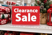 Clearance Sale 11 x 7 shelf sign price card in clear holder on a seasonal retail shelf