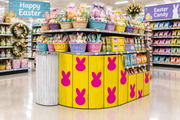 Easter bunny ears corrugated base pallet wrap on a retail store Easter basket and candy end cap display