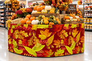 Fall corrugated base pallet wrap on a retail store Thanksgiving pumpkin display