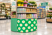 Spring Daisies corrugated base pallet wrap on a retail store spring display end cap