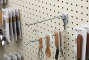 Galvanized drop peg hook holding kitchen utensils on pegboard with extra clearance below the scanning arm.