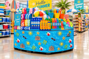 Summer corrugated base pallet wrap on a retail store beach and sunscreen end cap display
