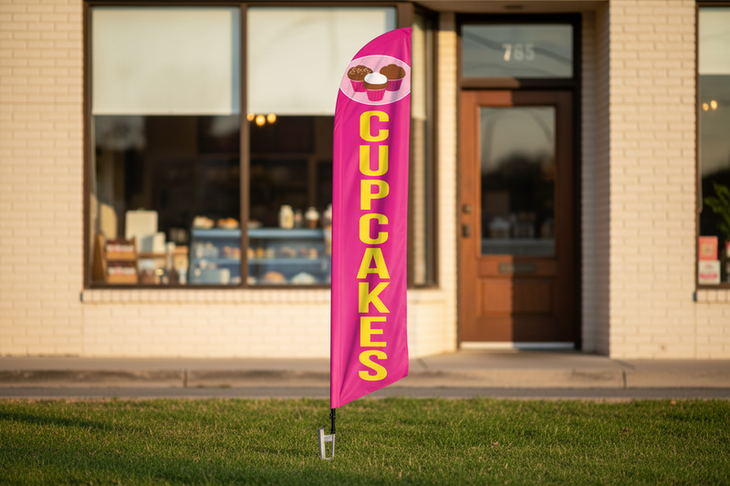 Pink Cupcakes feather flag in grass