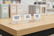 Short price cards sitting in the easel rail track