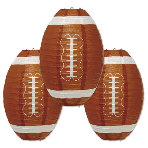 Three football-shaped paper lanterns with brown color and white details resembling a football pitch.