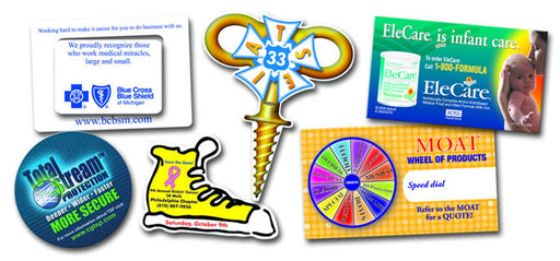 A collection of various custom printed magnets, featuring different shapes, designs, and colors.