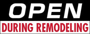Black and red open during remodeling sign with white text