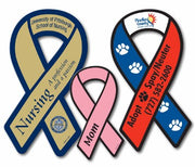 A collection of custom-printed awareness ribbon magnets in various colors, each with a different organization or cause name printed on them.